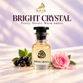 Al Barkah Bright Crystal 30ml perfume bottle with blackcurrants and a pink rose